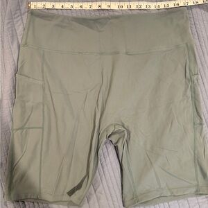 Baleaf light teal/sage 8-inch high-waist bike shorts with side pockets